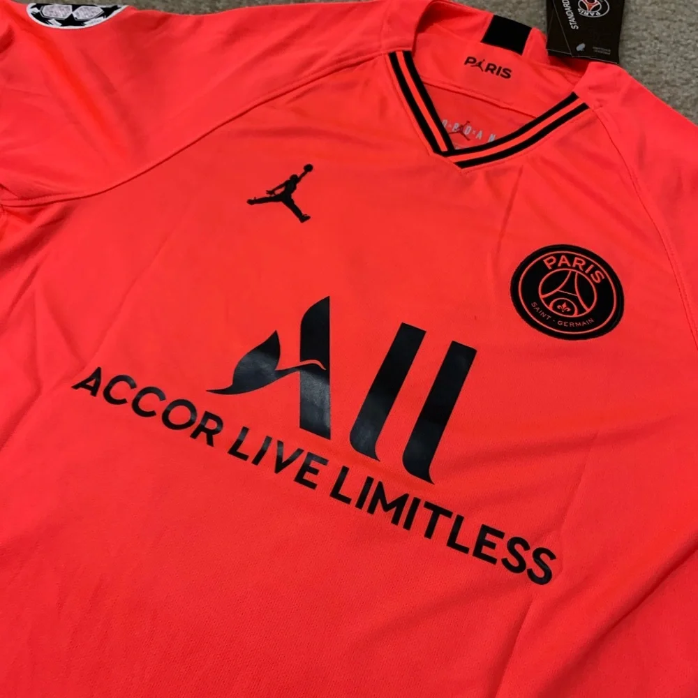 Jordan Men’s Mbappé #7 Short Sleeve Jersey - Neon Coral with Black Accents